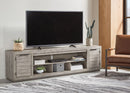 Naydell - XL TV Stand w/Fireplace Option - Gray