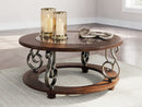 Frallyn - Round Cocktail Table - Dark Brown