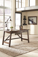 Baldridge - Home Office Large Leg Desk - Rustic Brown