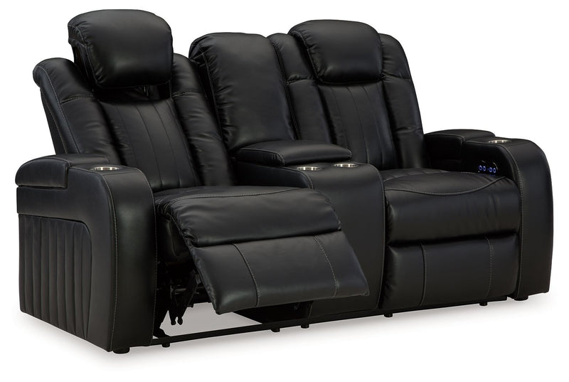 Caveman Den - Midnight - Power Reclining Loveseat With Console/ Adj Hdrst